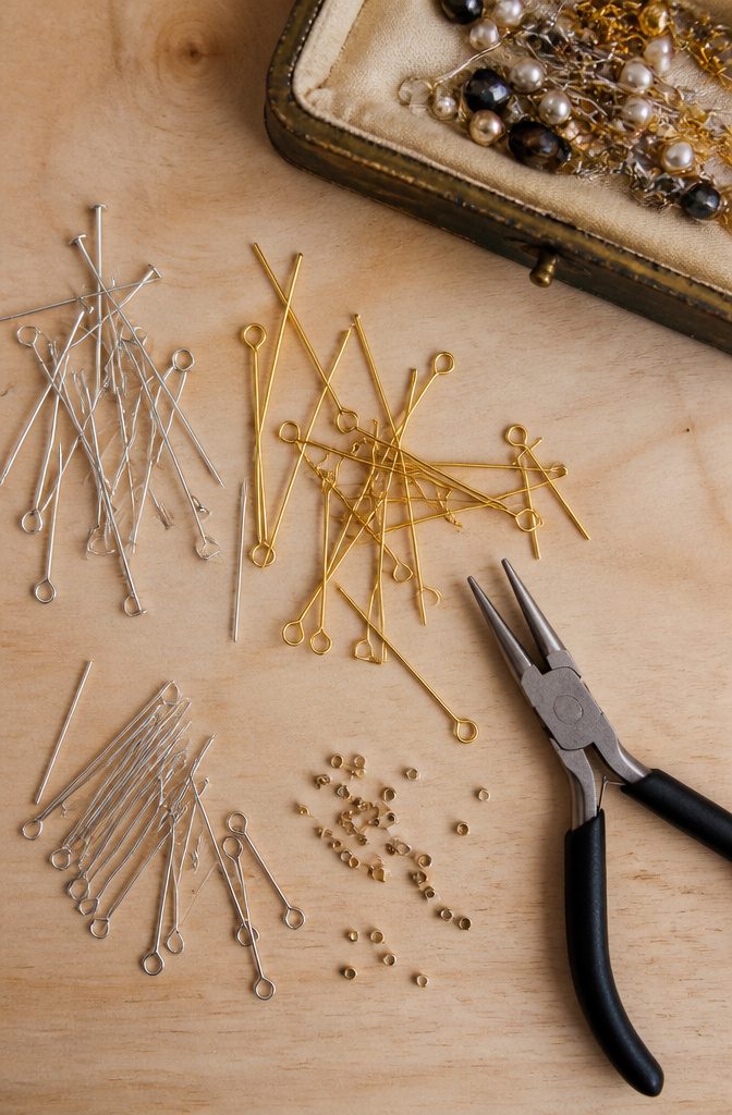 How to Build Your DIY Jewelry Essentials Kit: 9 Core Items 7 Jewelry findings including head pins, eye pins, and crimp beads displayed.