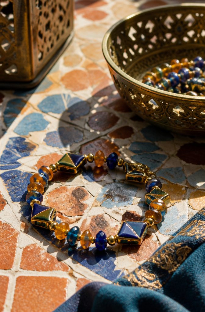 20 Handmade Jewelry Tutorials for Bracelets We Love 5 Moroccan Dreams Bracelet on a textured tile surface.