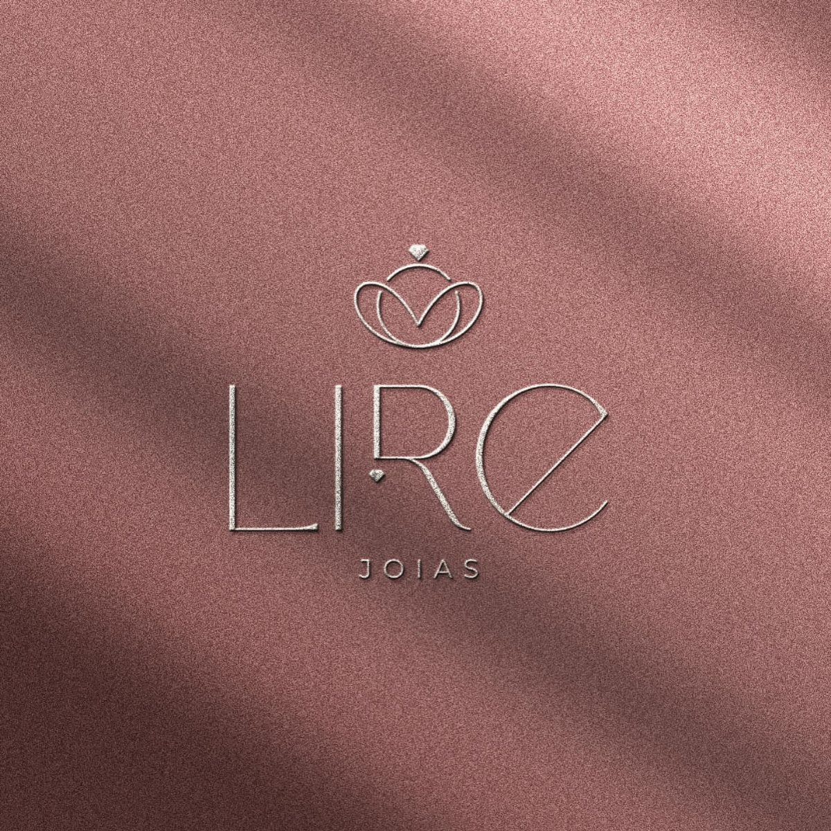 9 Jewelry Brand Logos From Tiffany Blue to Swarovski Swan 6 Silver LIRE JOIAS logo with a crown emblem on rose-gold glitter background