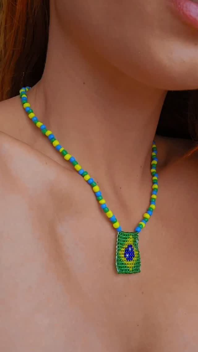 Seed Bead Crafts: 19 Patterns and Projects for 2026 11 Beaded necklace with yellow and blue beads and a rectangular woven pendant.