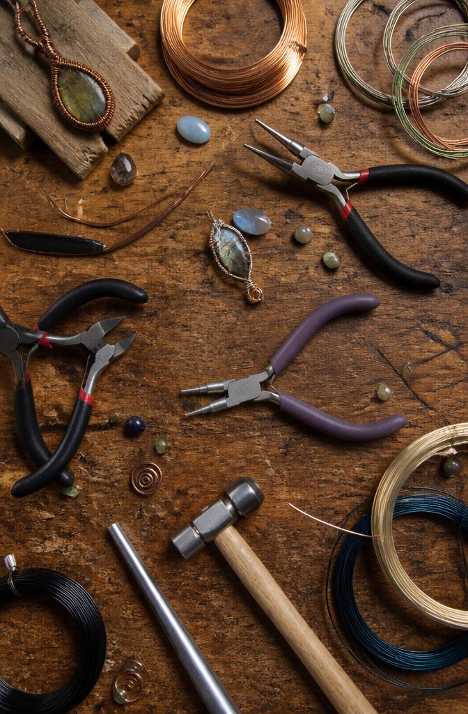 Wire Wrapping Jewelry: How to Wire Wrap a Stone Pendant 6 Wire cutters, pliers, ruler, and hammer for wire wrapping jewelry.