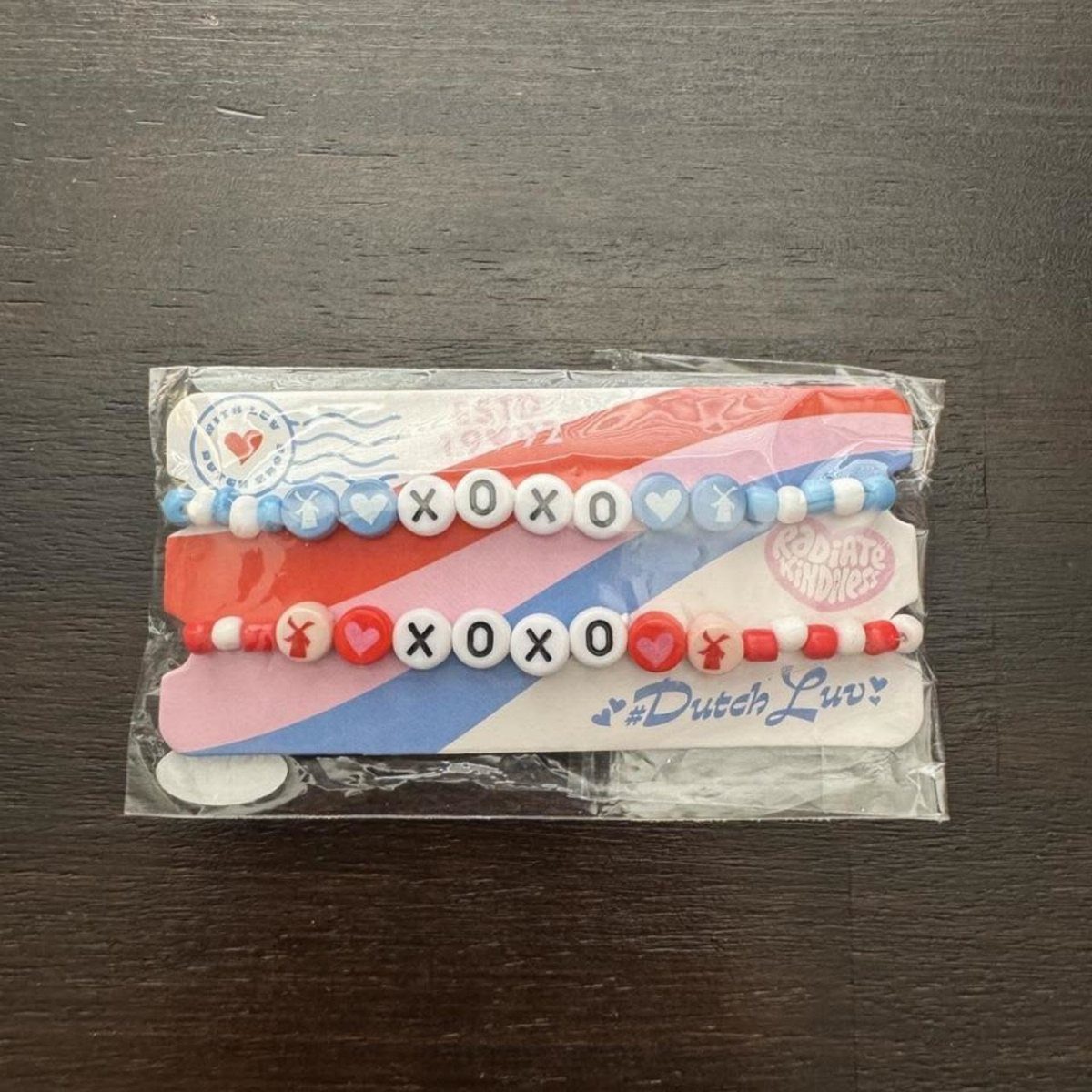 XOXO Jewelry Ideas: 10 Ways to Wear These Timeless Symbols 1 Two beaded bracelets with XOXO letter beads and hearts in a plastic package.